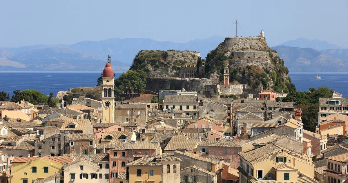 Corfu Old Town rooftops and the Old Fortress seen before a family Corfu boat tour