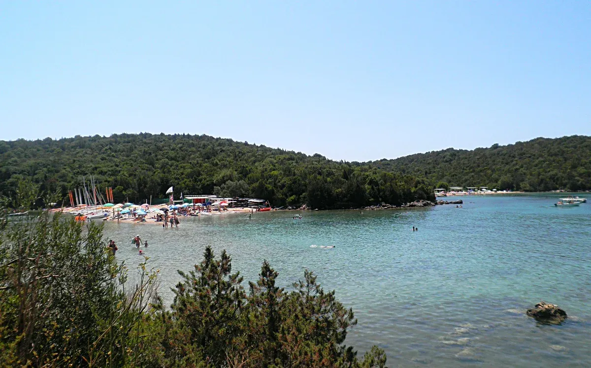 Green islets and clear water at Sivota on the mainland coast on a Corfu boat tour to the Blue Lagoon