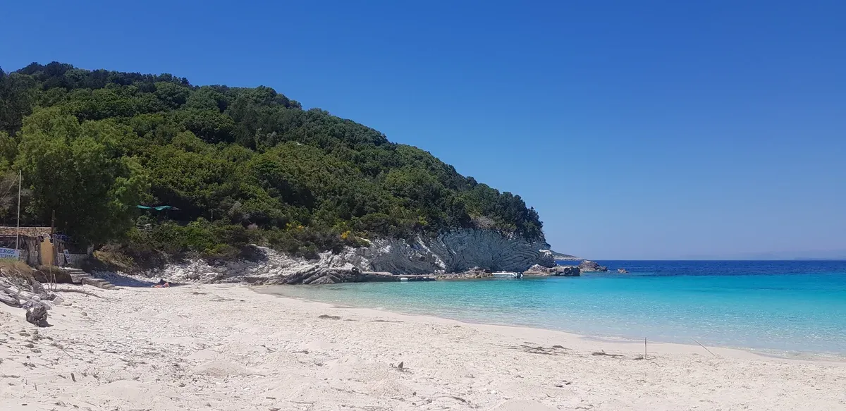 White sand and clear water at Vrika beach on Antipaxos on a semi-private Corfu boat tour